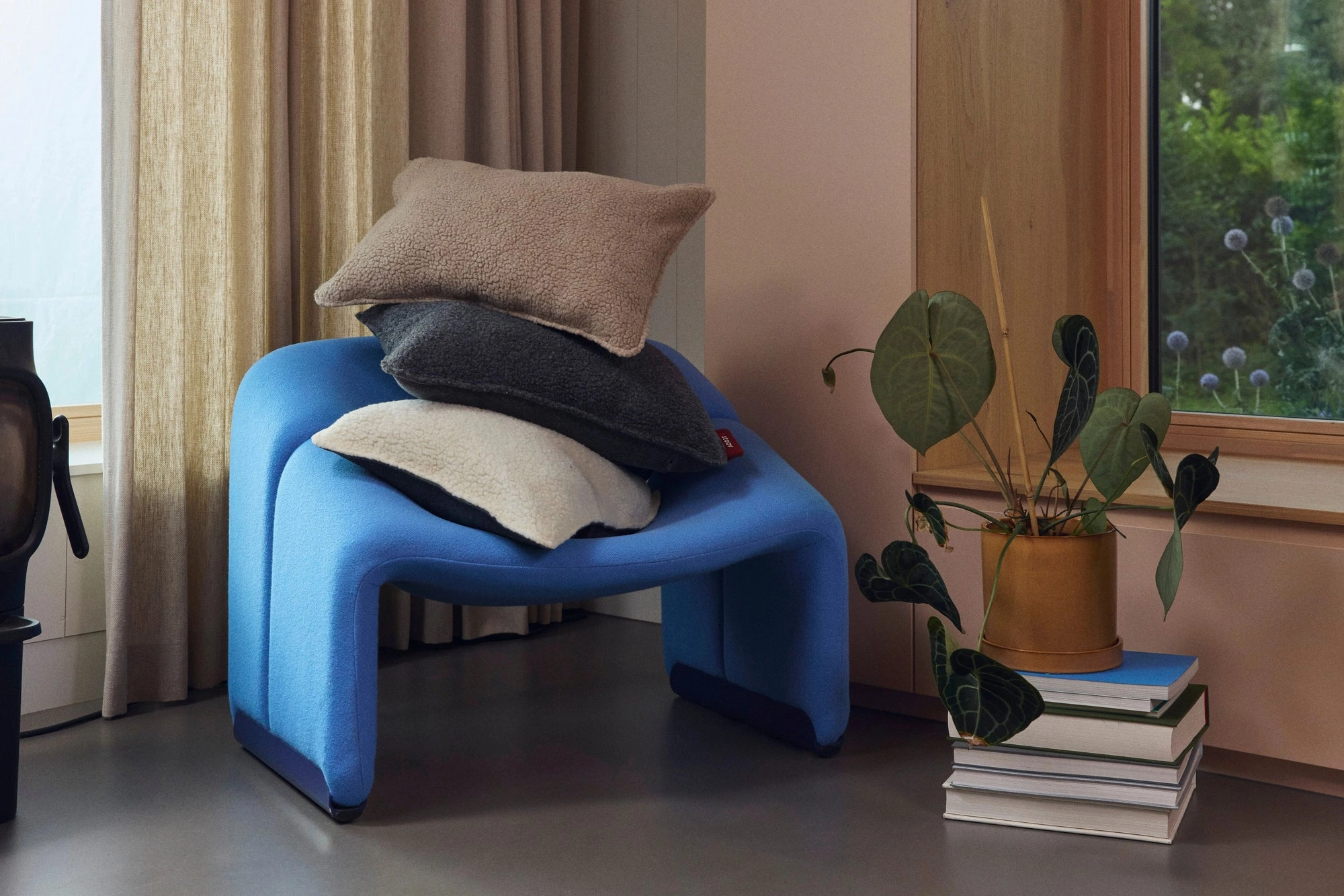 A Ploov cushion in a bright living room